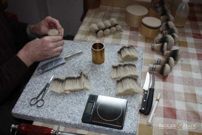 4. the forming box is tapped on the granite plate to get all the hairs aligned