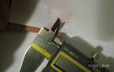 Cleaning Digital Caliper Inside Measuring Surfaces with Isopropyl Alcohol on Paper